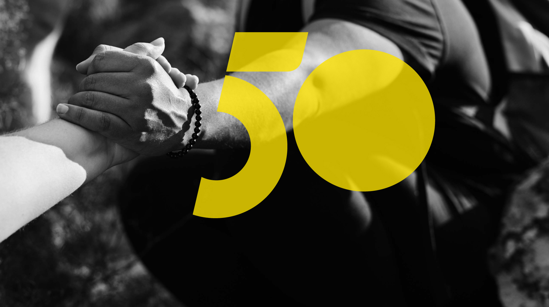 Commemorative montage for Machado Meyer's 50th birthday. Image with a handshake of two people on a white and black background and in the center the numbers 5 and 0 stylized in yellow, and the slogan Opening paths